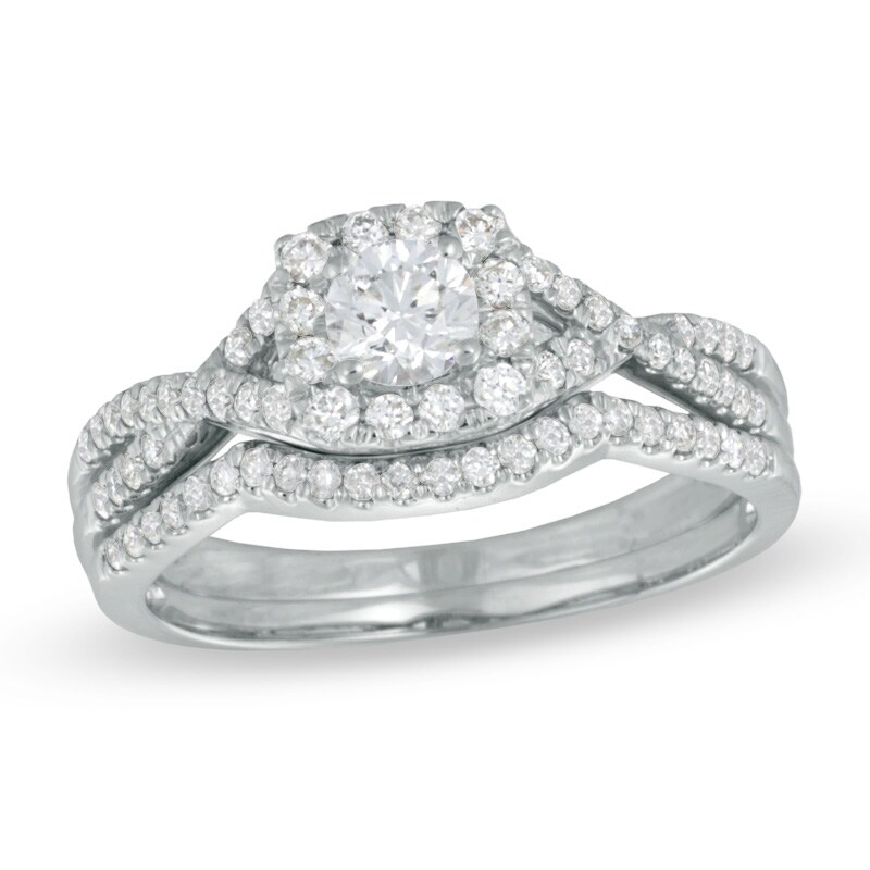 0.70 CT. T.W. Certified Canadian Diamond Twist Shank Bridal Set in