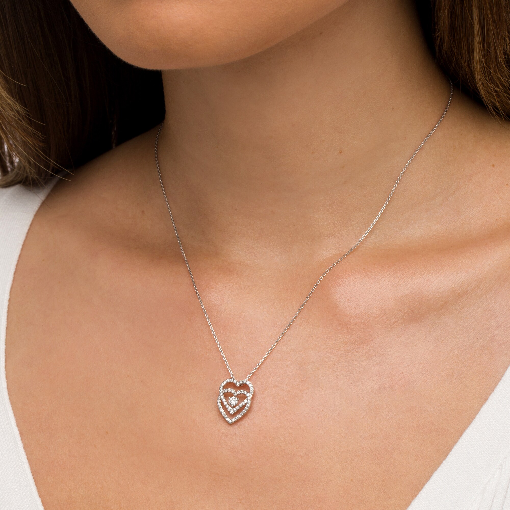 You Me Us 1/2 CT. T.W. Diamond Interlocking Hearts Pendant in 10K