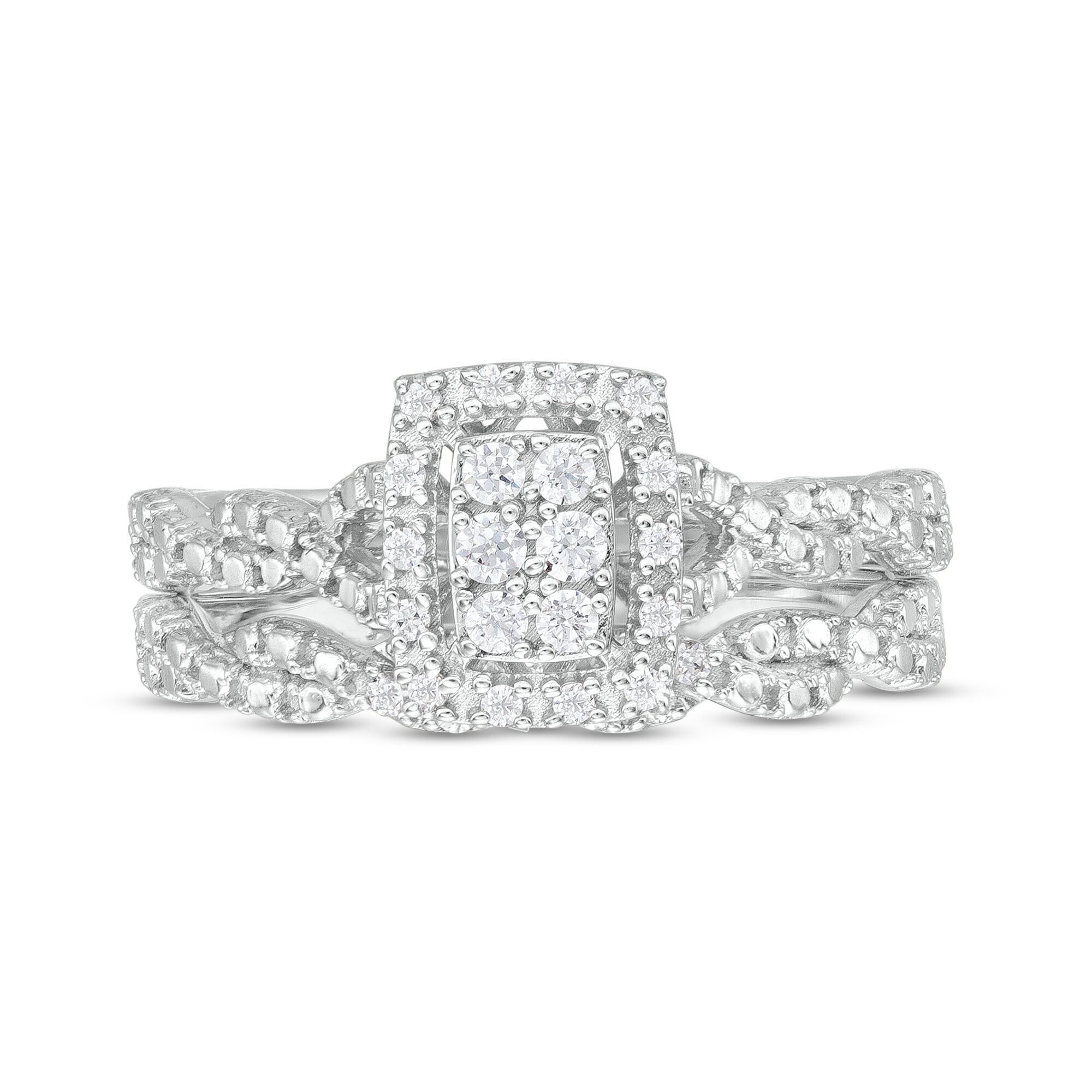 1/5 CT. T.W. Emerald-Shaped Multi-Diamond Open Cushion Frame Twist