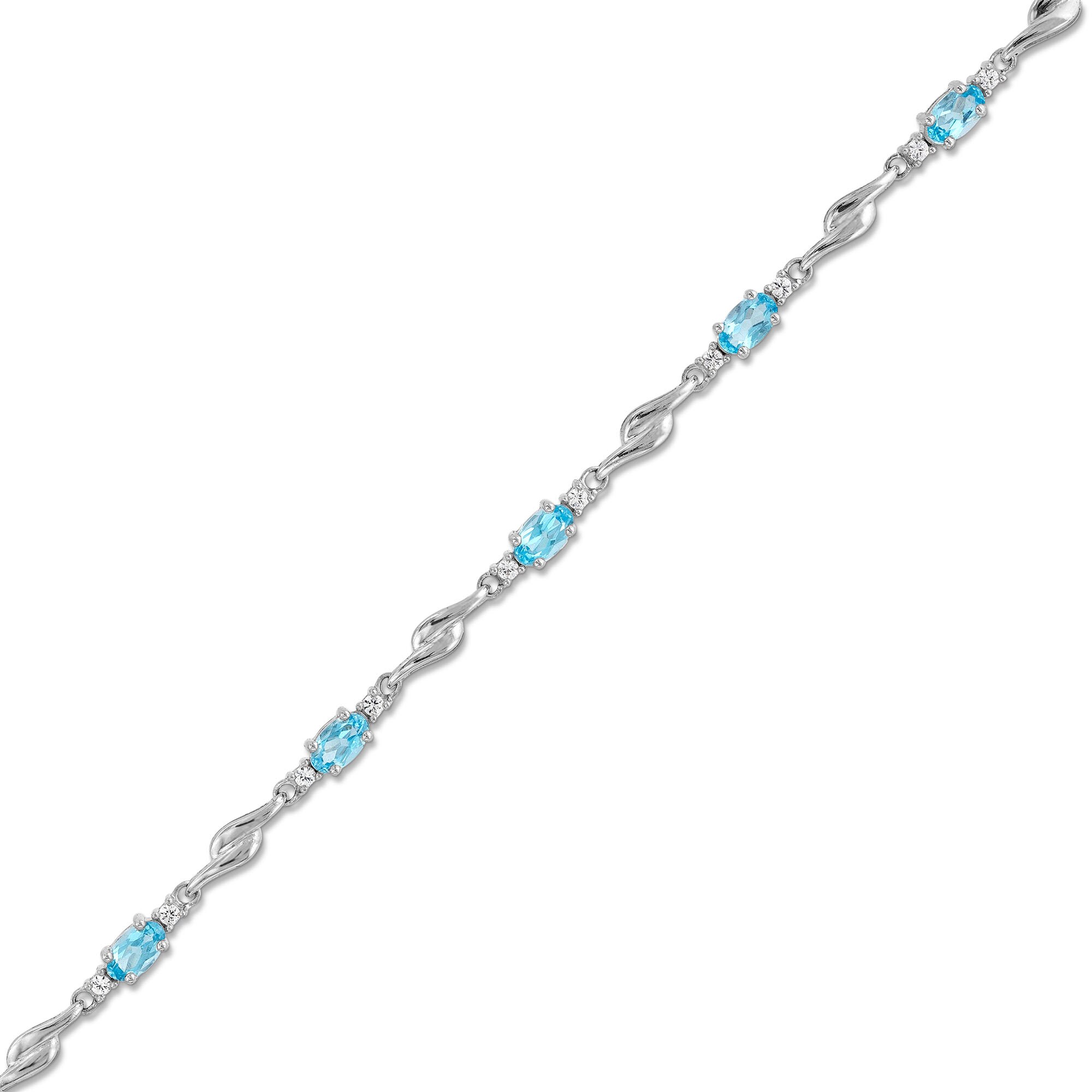 Oval Swiss Blue Topaz and White Lab-Created Sapphire Bypass Link