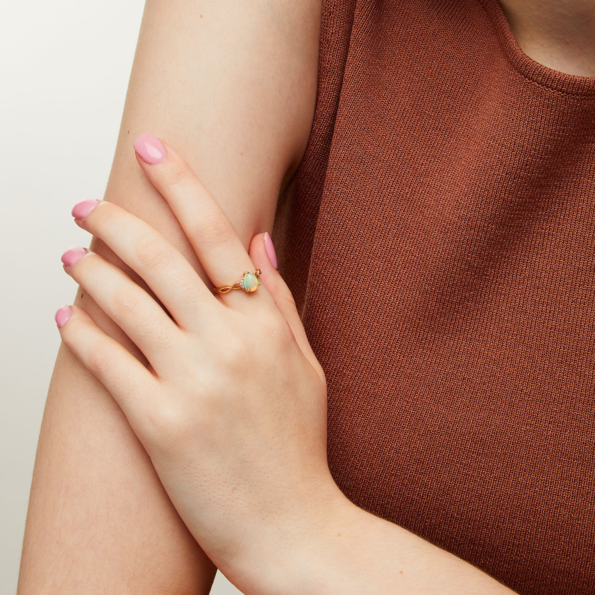 Pear-Shaped Opal and Diamond Accent Twist Shank Ring in 10K Gold