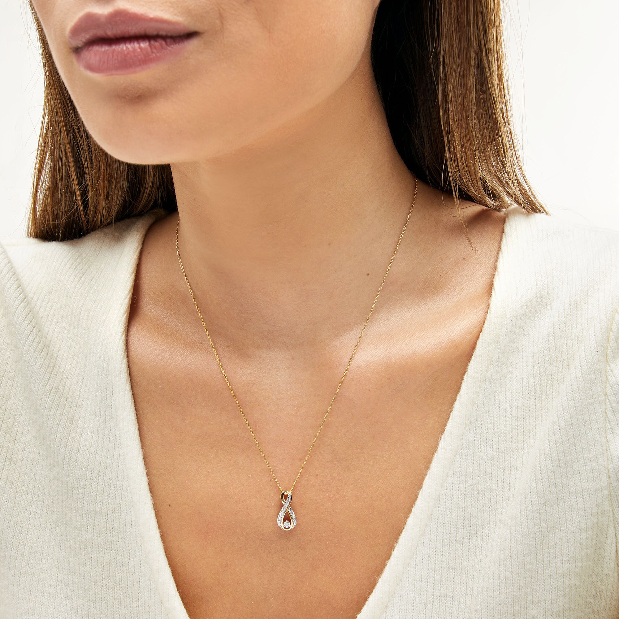 1/5 CT. T.W. Diamond Infinity Pendant in 10K Gold | Zales Outlet