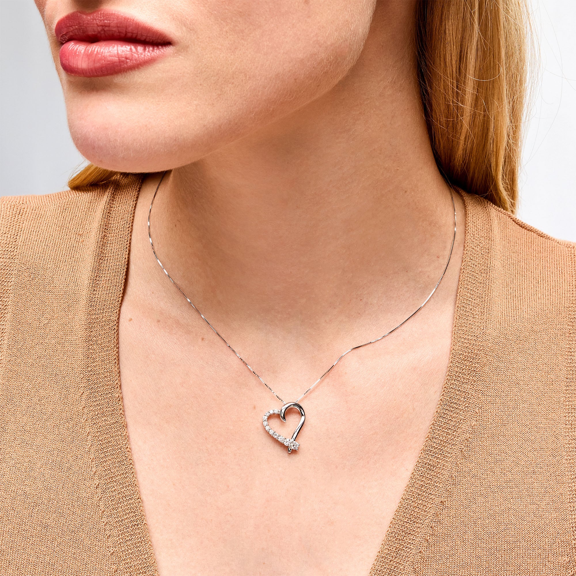 1/2 CT. T.W. Lab-Grown Diamond Tilted Crossover Heart Pendant in