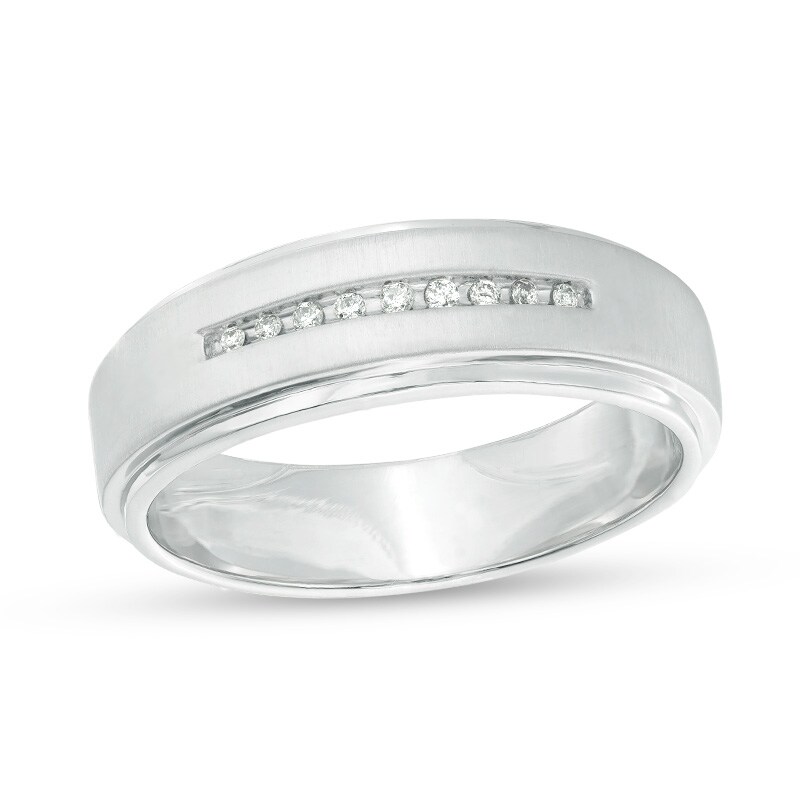 Previously Owned - 1/20 CT. T.W. Diamond Wedding Band in Sterling