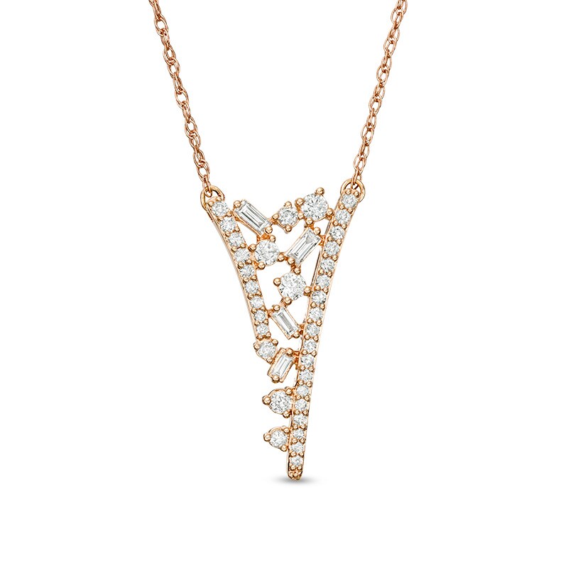 Previously Owned - 3/8 CT. T.W. Baguette and Round Diamond Scatter
